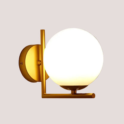 Gold Wall Light with a white glass ball and sleek golden structure, perfect for modern interiors.