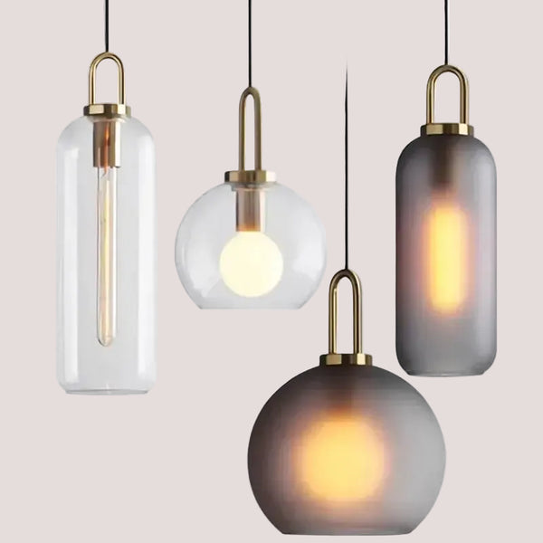 Grey Frosted Sphere Glass Hanging Lamp in a stylish arrangement with various shapes and designs.