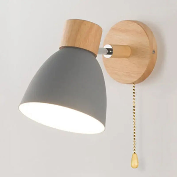 Modern Sconce With Switch featuring a sleek gray shade and wooden base, perfect for contemporary decor.