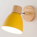 Modern Sconce With Switch in yellow and wood finish, perfect for contemporary home lighting.