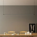 Super Simple Line Lighting | Modern LED Pendant Lamp hanging above a minimalist dining table, showcasing modern elegance.