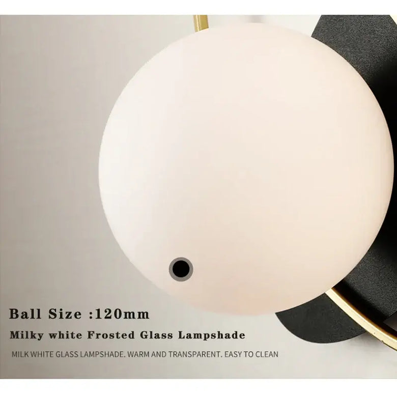 Art Deco Golden Circle Sconce featuring a milky white frosted glass lampshade with a 120mm ball size.