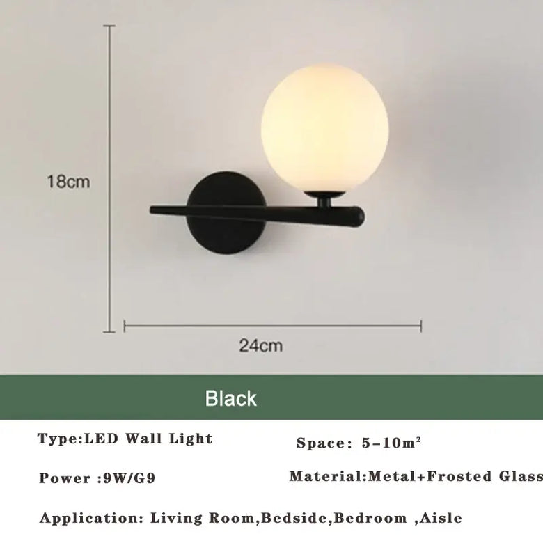 Art Deco Golden Circle Sconce in elegant design with glowing orb for stylish lighting in living spaces.