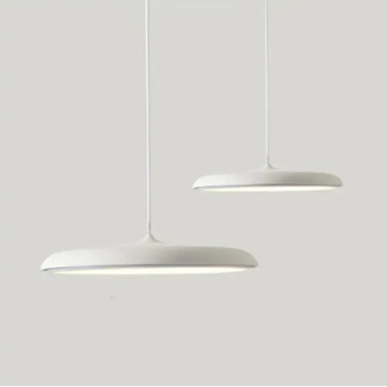 Minimalist Metal Hanging Lamp showcasing contemporary design with sleek white finish and elegant lighting.