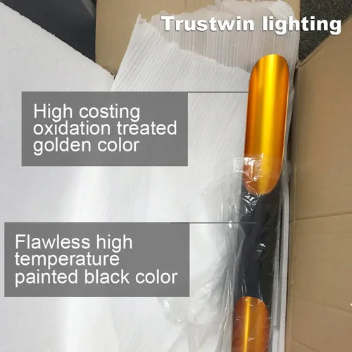 Nordic Glow Tubular Sconce showcasing high-cost oxidation treated golden and flawless black painted colors.