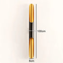 Nordic Glow Tubular Sconce with sleek design, gold and black finish, dimensions 100cm x 8cm.