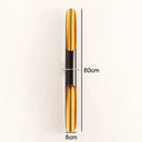 Nordic Glow Tubular Sconce featuring a sleek black and gold design, dimensions 80cm x 8cm, ideal for modern interiors.