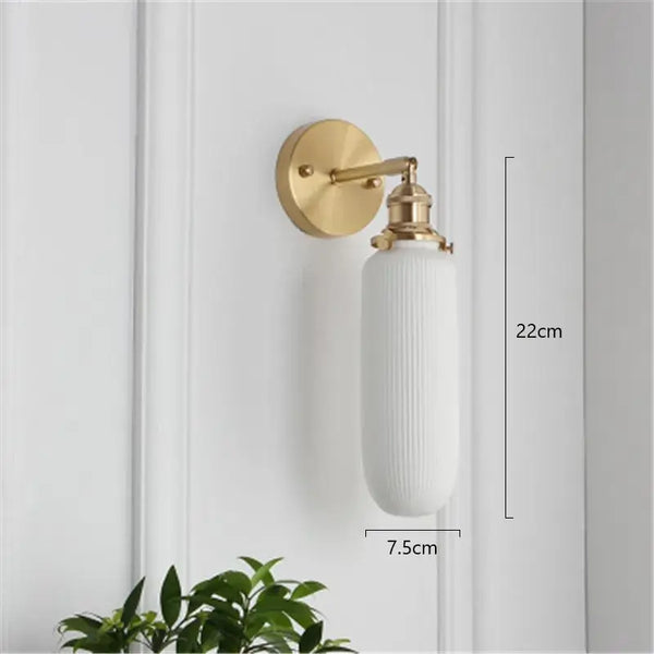 Timeless Elegance: Nordic White Porcelain Wall Lamp with gold mount and white porcelain shade.