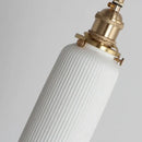 Timeless Elegance: Nordic White Porcelain Wall Lamp with gold mount and textured porcelain shade.
