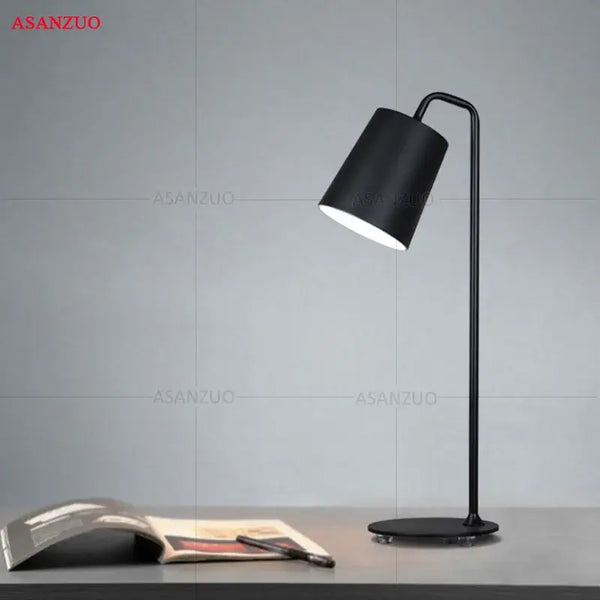 Metal Desk Lamp with modern minimalist design in black, perfect for contemporary decor and energy-efficient lighting.