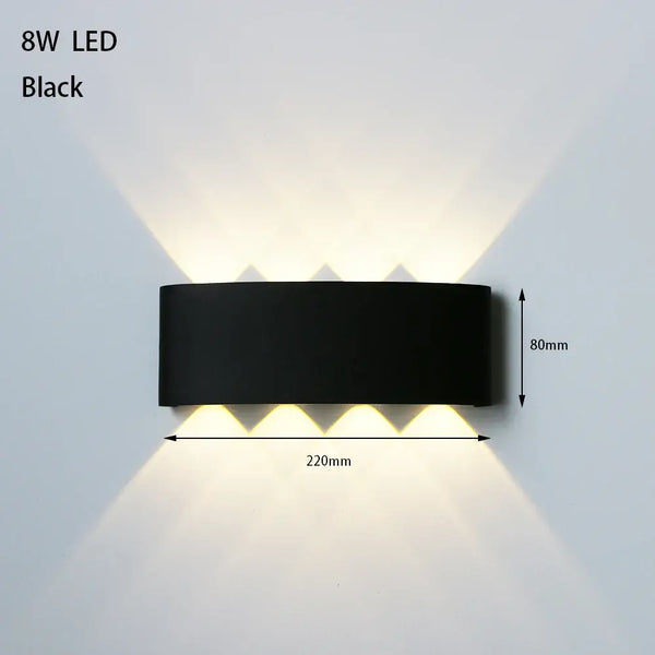 Bathroom Modern Waterproof LED Wall Lamp - Black or White with Gold IP65 in black finish illuminating a wall.