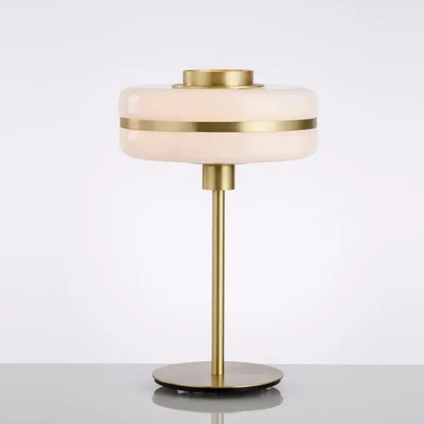 Milky Glass Gold Art Deco pendant light featuring a frosted glass base and brass accents for elegant home decor.