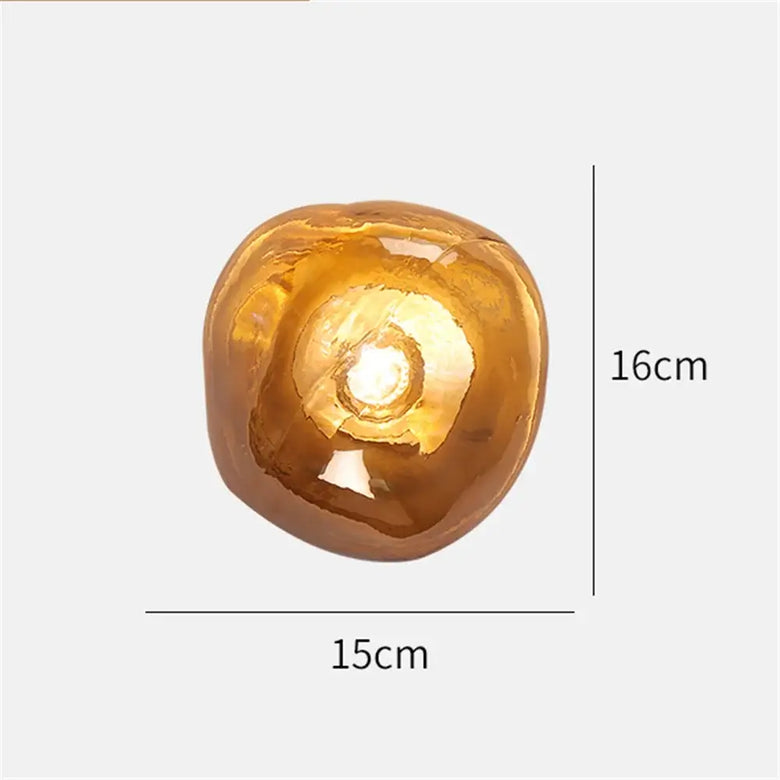 Lava Glass Wall Lamp with dimensions 15cm x 16cm, showcasing its unique design and warm glow.