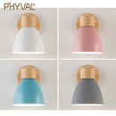 Modern Sconce With Switch in white, pink, blue, and gray color options on a wooden base.