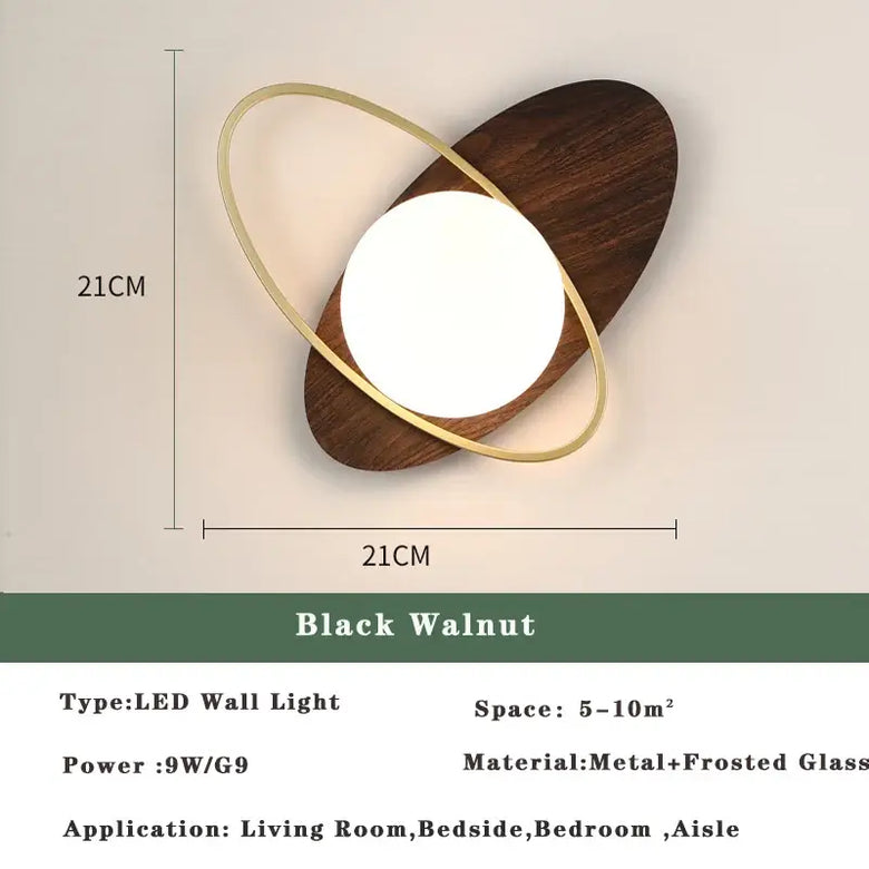 Art Deco Golden Circle Sconce featuring a unique black walnut design with elegant LED illumination.