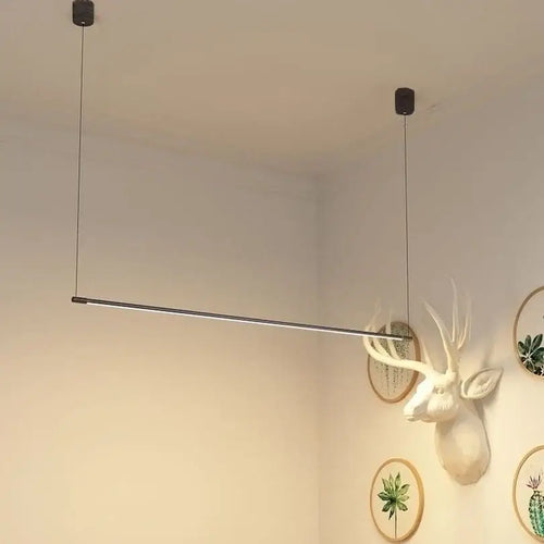 Super Simple Linear Lighting in modern decor with minimalistic design and wall art accent.