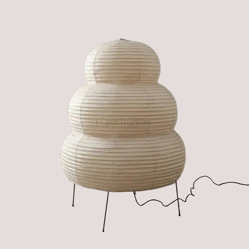 Japanese White Rice Paper Table Lamp with a unique, layered design, providing warm, diffuse lighting for any space.