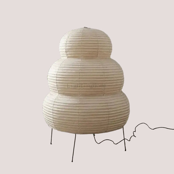 Japanese White Rice Paper Table Lamp with a unique, layered design, providing warm, diffuse lighting for any space.