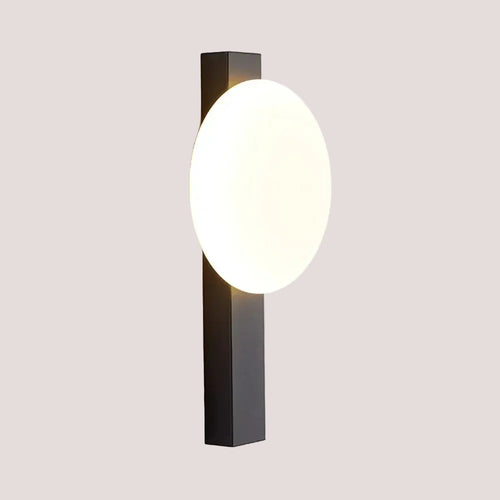 Minimalist Nordic Wall Lamp with Frosted White Ball illuminating a modern interior with sleek design.