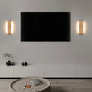Modern Brushed Gold & Coffee LED Wall Lamp – Sleek Indoor Accent Lighting illuminating a stylish living room.