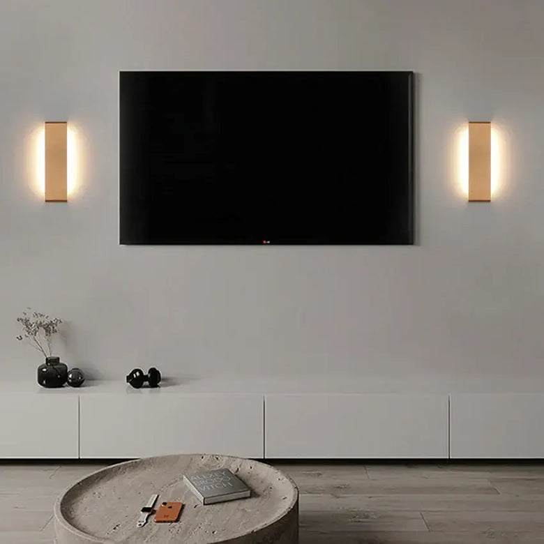Modern Brushed Gold & Coffee LED Wall Lamp – Sleek Indoor Accent Lighting enhancing a stylish living room.