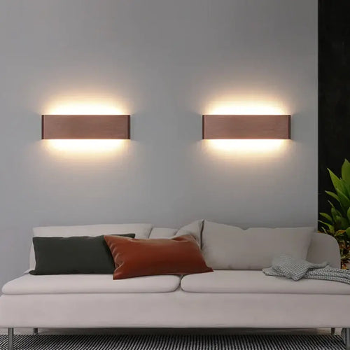 Modern Brushed Gold & Coffee LED Wall Lamp – Sleek Indoor Accent Lighting above a stylish sofa in a contemporary living room.