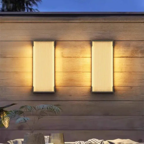 Modern Outdoor Waterproof Stainless Steel Wall Light – Warm & Cool White illuminating a wooden wall.
