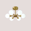 Modern Copper Glass Ball Chandelier showcasing Mid-Century style with frosted glass shades and trumpet arms.