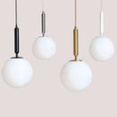 Modern Gold Glass Ball Pendant featuring sleek white glass and metal design, perfect for stylish interiors.