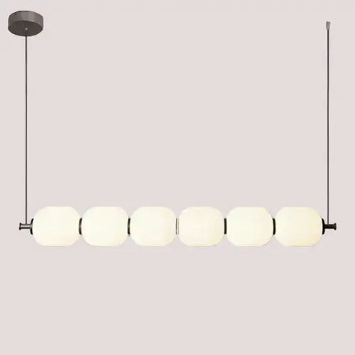 Nordic Art Deco Linear LED Pendant Light – Sculptural Acrylic & Iron Chandelier with acrylic shades and iron details.