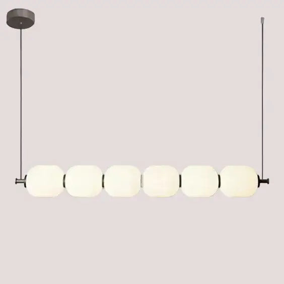 Nordic Art Deco Linear LED Pendant Light – Sculptural Acrylic & Iron Chandelier in modern interior design.