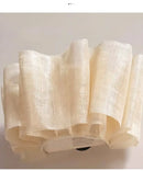 Off-White Pendant Light made from Natural Plant Fiber showcasing textured natural fabric.