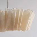 Off-White Pendant Light made from Natural Plant Fiber, showcasing its soft texture and warm glow.