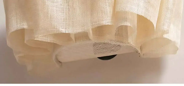Off-White Pendant Light made from Natural Plant Fiber showcasing its soft, organic texture and elegant design.