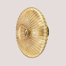 Radiant Modern Glass Wall Lamp with elegant glass ridge pattern in amber, ideal for various decor styles.