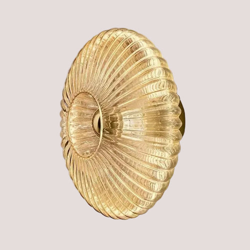 Radiant Modern Glass Wall Lamp with elegant glass ridge pattern in amber, ideal for various decor styles.