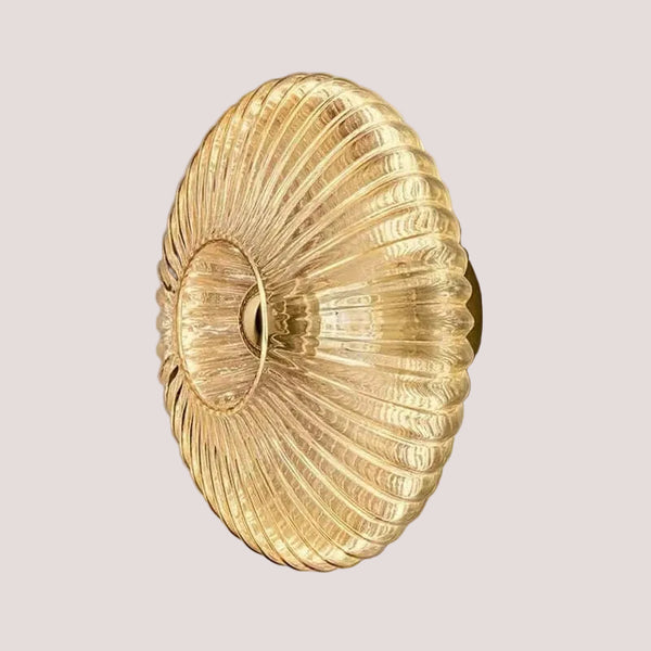 Radiant Modern Glass Wall Lamp with elegant glass ridge pattern in amber, ideal for various decor styles.