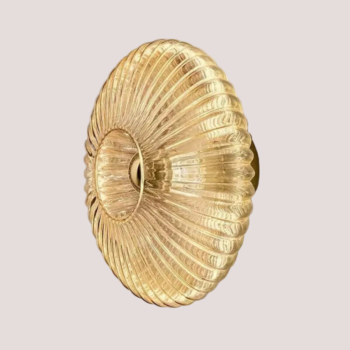 Radiant Modern Glass Wall Lamp with elegant glass ridge pattern in amber, ideal for various decor styles.