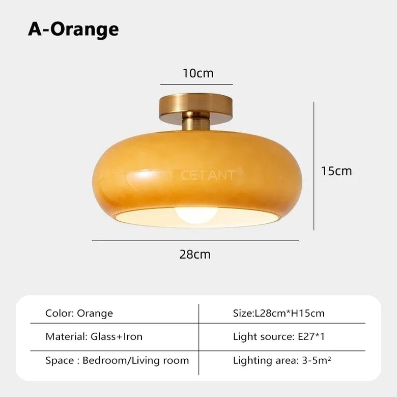 A-Orange ceiling light fixture with dimension labels showing 10cm, 15cm, and 28cm, plus a specification table below stating color Orange, size L28cm*H15cm, material Glass+Iron, light source E27*1, and lighting area 3-5m².