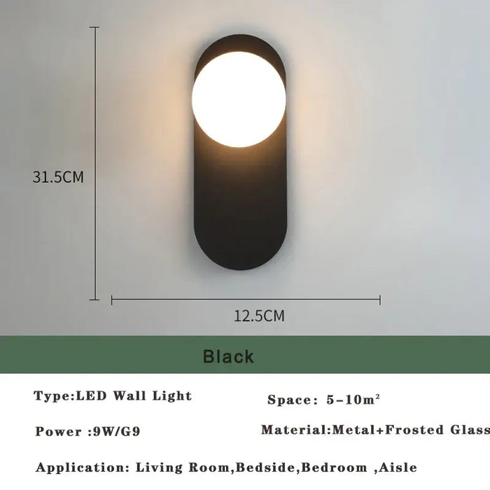 Art Deco Golden Circle Sconce in black, LED wall light with frosted glass, perfect for living room or bedroom.