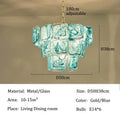 Blue Glass Chandelier with Polished Chrome Finish in living dining room, showcasing artisan craftsmanship and elegant design.