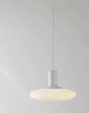 Nordic UFO LED Pendant Light – Minimalist Floating Disc Ceiling Lamp hanging with soft glow on a neutral background.