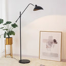 Marble Based 50s Floor Lamp - Vintage Modern Lighting in a stylish indoor setting with modern decor and art.