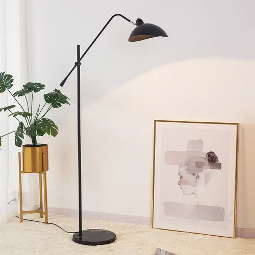Marble Based 50s Floor Lamp - Vintage Modern Lighting in a stylish indoor setting with modern decor and art.