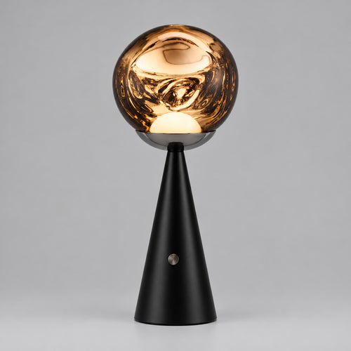 Hero Cordless Lava able lamp with a glossy, reflective metallic gold globe shade on a black cone base,