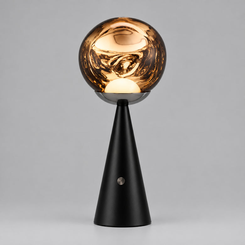 Hero Cordless Lava able lamp with a glossy, reflective metallic gold globe shade on a black cone base, 