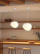 Simple Nordic Restaurant Pebble Chandelier in a modern kitchen setting with minimalist decor.