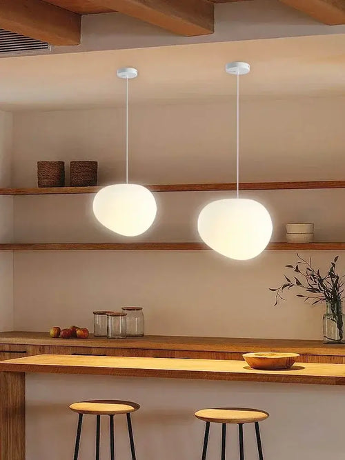 Simple Nordic Restaurant Pebble Chandelier in a modern kitchen setting with minimalist decor.