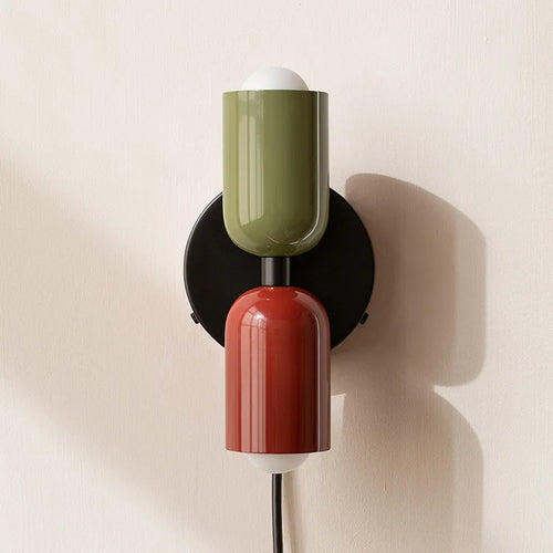 Postmodern Two-Tone Pill Wall Sconce, on black plate