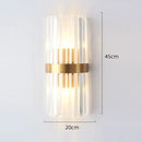 Unique Collection of Art Deco Sconces featuring elegant glass design and gold accents, ideal for adding luxury to your space.